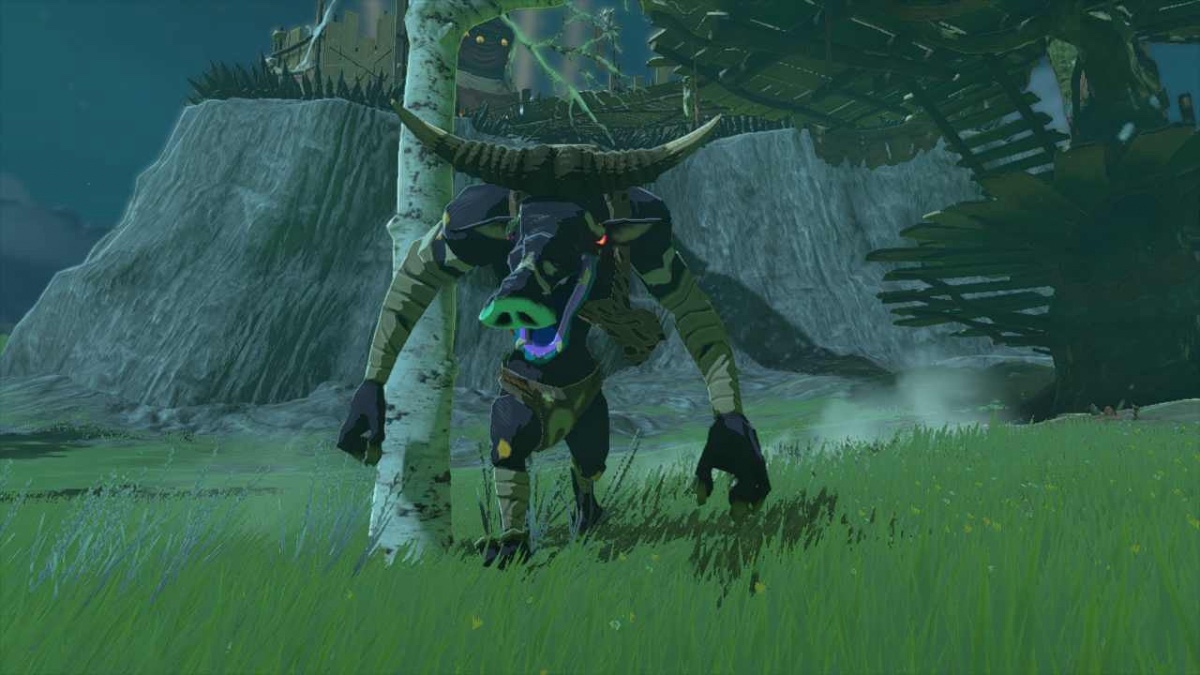 A Blue Moblin, which resembles a minotaur, walks menacingly towards the camera across a dark field.